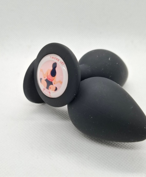 Limitowany korek analny „Twerk It!” – czarny silikonowy butt plug z ozdobną grafiką kobiety w pozycji twerk.